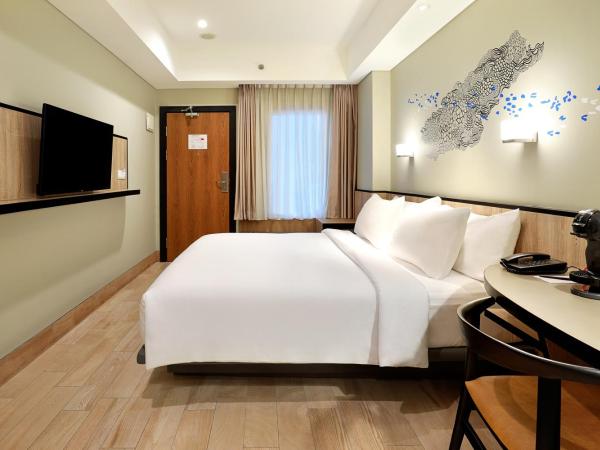 Swiss-Belinn Wahid Hasyim : photo 3 de la chambre chambre lit queen-size deluxe