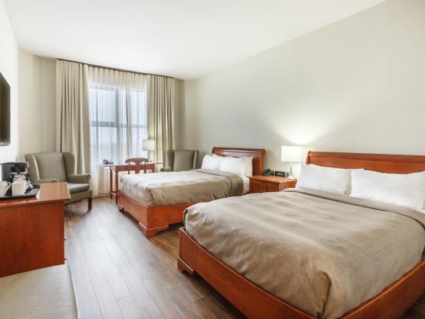 Hotel Chateau Laurier Québec : photo 6 de la chambre chambre double standard avec 2 lits doubles