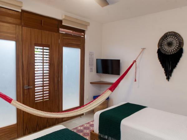 Latino Hotel Boutique : photo 3 de la chambre petite chambre lits jumeaux