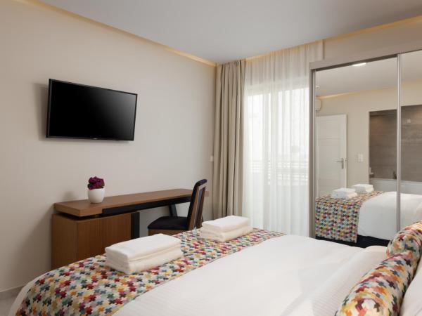 Bio Suites Hotel & Spa : photo 2 de la chambre suite deluxe avec baignoire spa