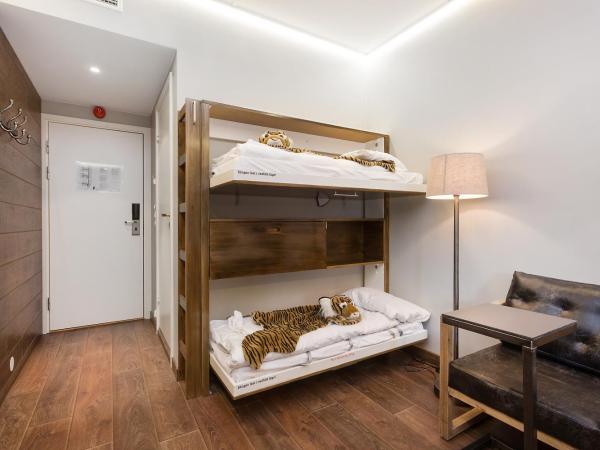 Dyreparken Safarihotell : photo 3 de la chambre double room with small bunk bed (140cm)