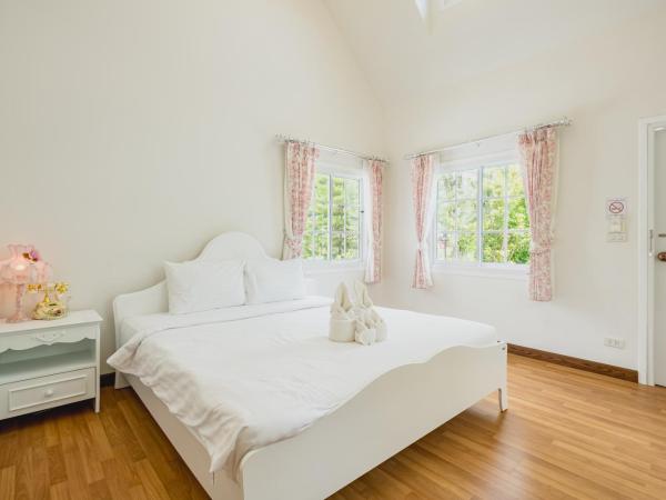 Sakarin Valley Resort : photo 3 de la chambre chambre lit queen-size - vue sur jardin