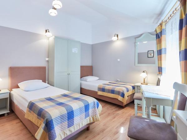 Batory Annex : photo 2 de la chambre chambre lits jumeaux Économique