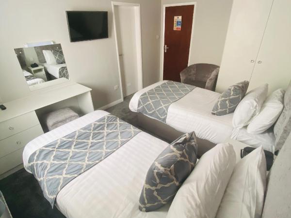 Doric Hotel : photo 1 de la chambre chambre lits jumeaux