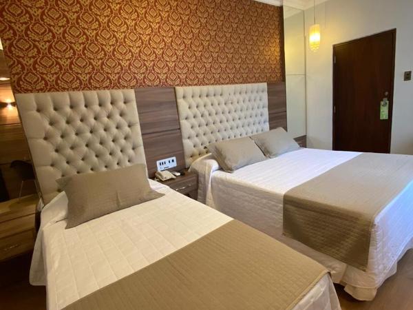 Curitiba Palace Hotel : photo 6 de la chambre chambre triple deluxe