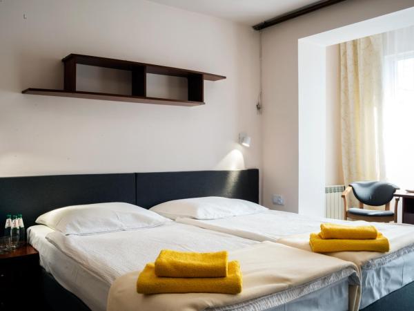 Graal SPA : photo 1 de la chambre chambre lits jumeaux