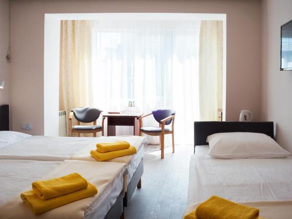 Graal SPA : photo 1 de la chambre chambre triple