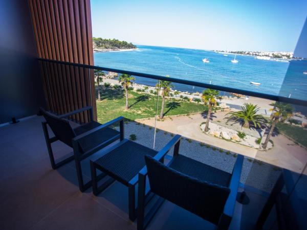 LIBERTY PLAZA : photo 5 de la chambre chambre double de luxe avec terrasse - vue sur mer