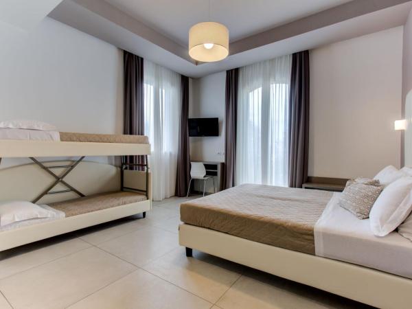 Hotel Villa Augustea : photo 1 de la chambre chambre quadruple