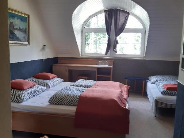 Berg Toboz Panzió : photo 5 de la chambre chambre triple