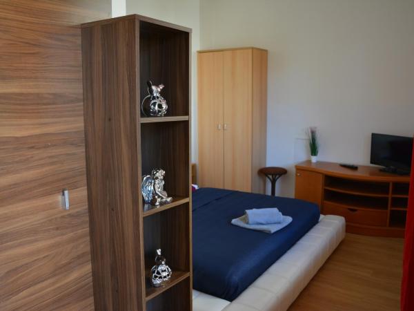 Penzion Locanda : photo 1 de la chambre chambre triple avec terrasse