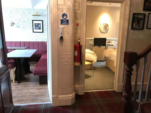 Raffles Hotel : photo 1 de la chambre chambre lits jumeaux avec douche