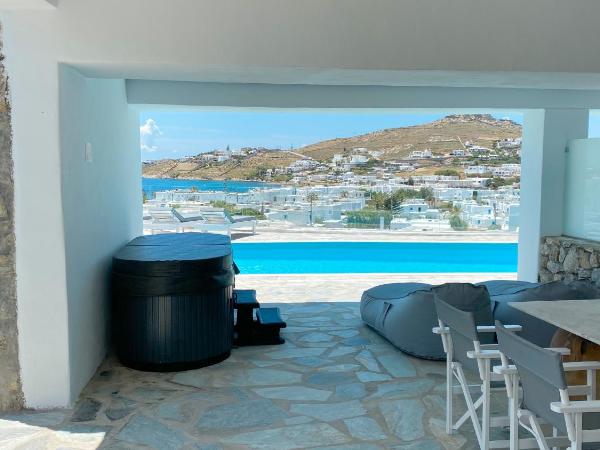 Amperian Mykonos Suites & Villas : photo 3 de la chambre appartement avec jacuzzi - vue sur mer