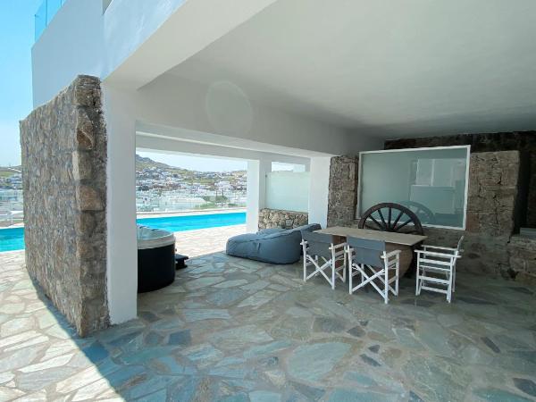 Amperian Mykonos Suites & Villas : photo 2 de la chambre appartement avec jacuzzi - vue sur mer