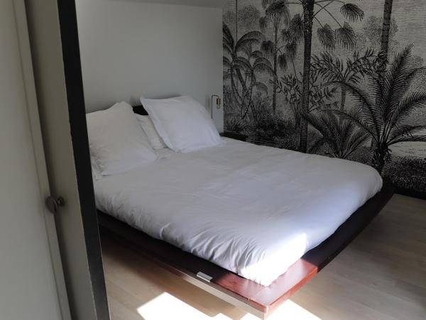 L'Herbe Haute : photo 6 de la chambre chambre double - vue sur jardin