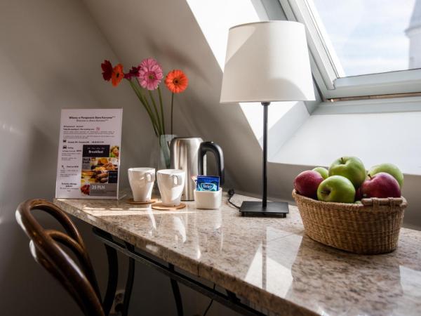 Oliwa Park Residence : photo 5 de la chambre grande chambre double ou lits jumeaux