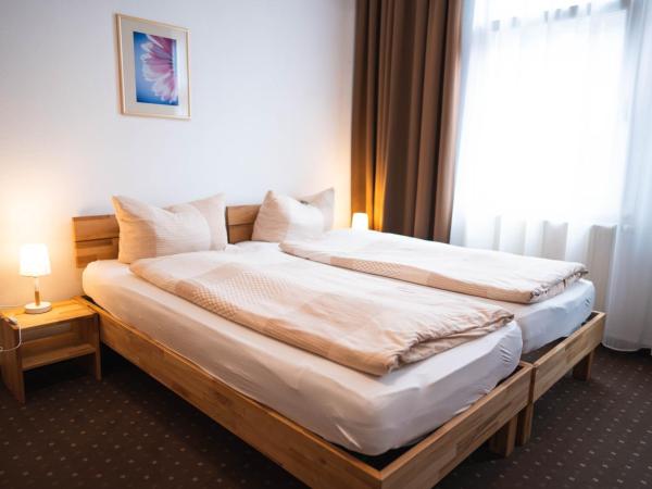 Pension am Heusteig : photo 5 de la chambre chambre triple standard