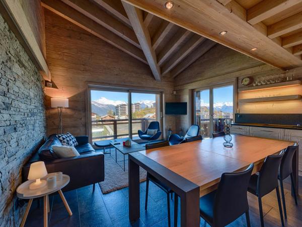 Nendaz 4 Vallées & SPA 4* Superior : photo 1 de la chambre appartement avec balcon