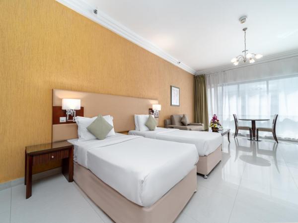 Star Metro Deira Hotel Apartments : photo 1 de la chambre studio lits jumeaux de luxe