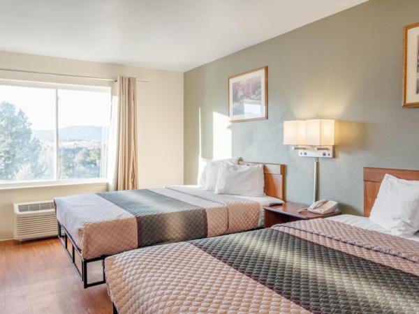 HomeTowne Studios by Red Roof Colorado Springs - Airport : photo 1 de la chambre studio room with two double beds non-smoking