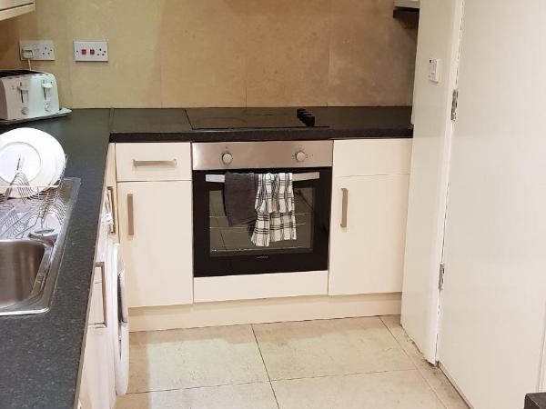 Hour Glass Hotel : photo 3 de la chambre chambre lits jumeaux avec salle de bains commune