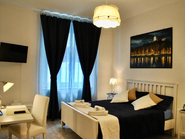 B&B Casa TORET : photo 1 de la chambre chambre double avec lit d'appoint