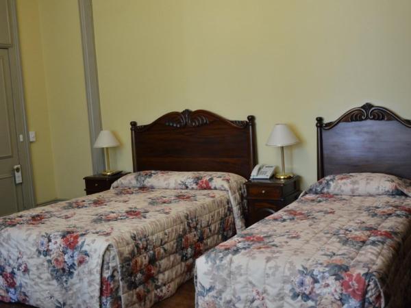 Avonmore On The Park Boutique Hotel : photo 1 de la chambre chambre lits jumeaux - vue sur jardin
