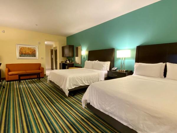 Holiday Inn Express Hotel & Suites Orlando East-UCF Area, an IHG Hotel : photo 4 de la chambre suite exécutive avec 2 lits queen-size - non-fumeurs 