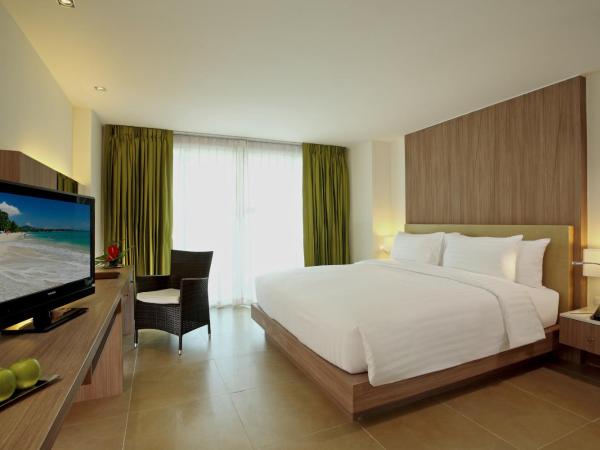 Centara Pattaya Hotel : photo 9 de la chambre hébergement lit king-size deluxe