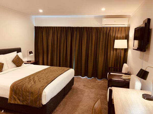 Alpers Lodge & Conference Centre : photo 4 de la chambre chambre lit king-size deluxe