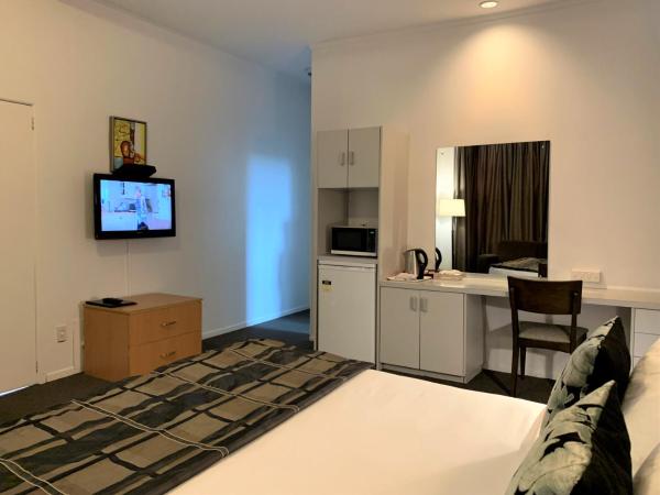 Alpers Lodge & Conference Centre : photo 1 de la chambre chambre lit king-size deluxe
