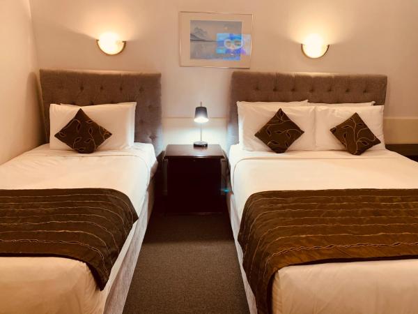Alpers Lodge & Conference Centre : photo 8 de la chambre chambre lits jumeaux deluxe