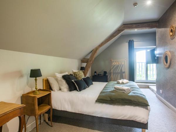 Le Château des Forges : photo 1 de la chambre chambre double - vue sur jardin - annexe