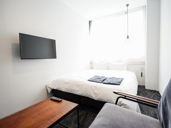 Hotel Potmum Sapporo : photo 1 de la chambre chambre double avec salle de bains privative