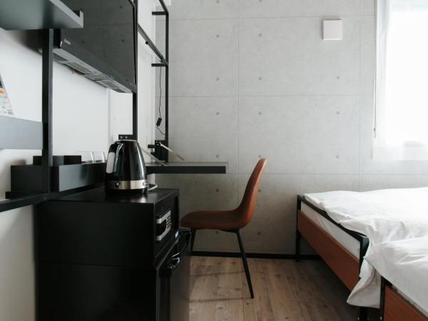 Hotel Potmum Sapporo : photo 6 de la chambre chambre lits jumeaux spacieuse