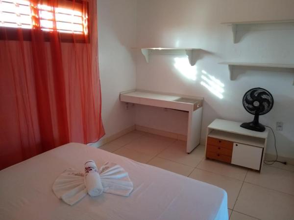 Pousada Innova : photo 8 de la chambre two-bedroom apartment with bath tub and balcony 