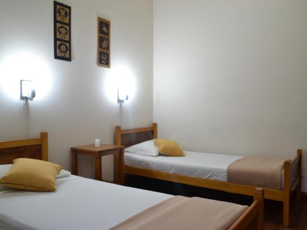 Che Argentina Hostel Suites : photo 3 de la chambre chambre double avec 2 lits doubles