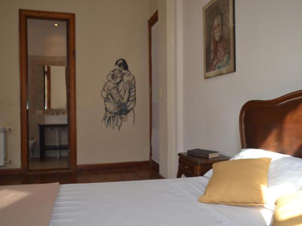 Che Argentina Hostel Suites : photo 2 de la chambre chambre quadruple avec salle de bains privative