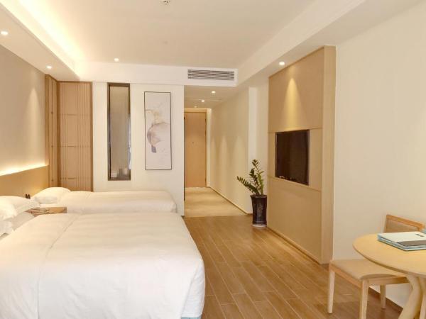 Sanya South China Hotel : photo 9 de la chambre chambre triple jardin