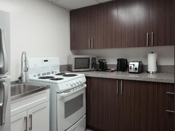 The Business Inn : photo 4 de la chambre suite 1 chambre avec 1 lit queen-size