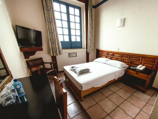 Hotel Colonial : photo 4 de la chambre petite chambre double