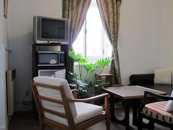 Au Petit Hôtel : photo 4 de la chambre chambre double avec 2 lits doubles