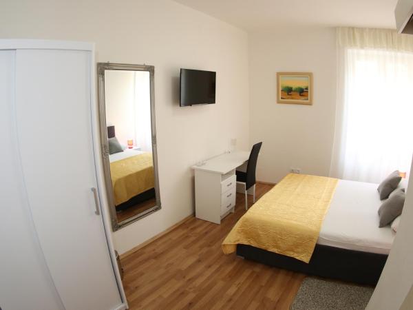 A&M Apartment and Rooms : photo 4 de la chambre chambre double