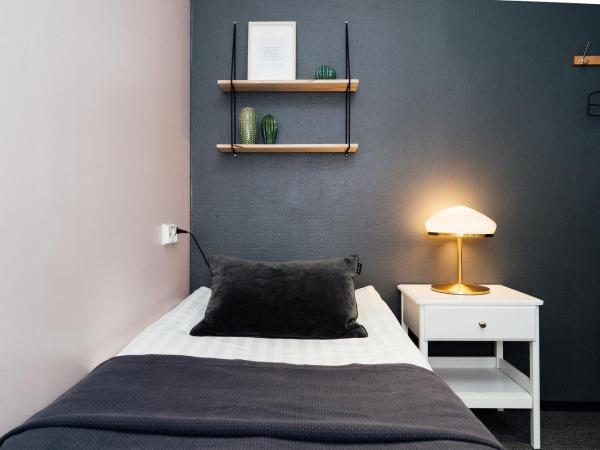 The Yard Hostel : photo 1 de la chambre chambre simple Économique avec salle de bains commune sans fenêtre