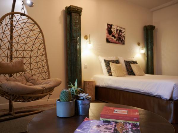 Maison Anjali : photo 2 de la chambre chambre triple standard - vue sur jardin - hampi