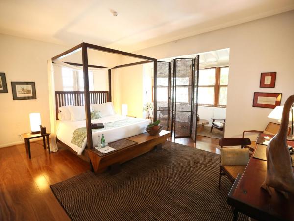 Santa Teresa Hotel RJ - MGallery : photo 1 de la chambre suite lit king-size junior avec salon et vue