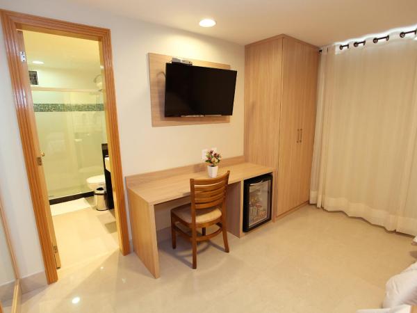 Elegance Praia Hotel : photo 10 de la chambre chambre triple