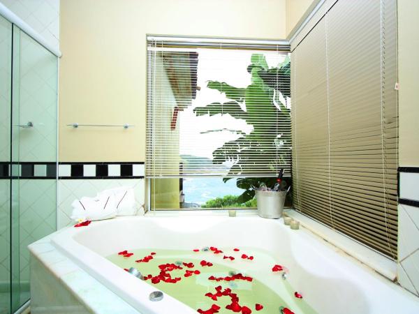 Uni Boutique Hotel & Spa : photo 8 de la chambre suite lit king-size avec baignoire spa