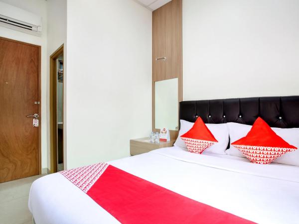 Capital O 106 Sarkawi Residence : photo 2 de la chambre chambre double standard