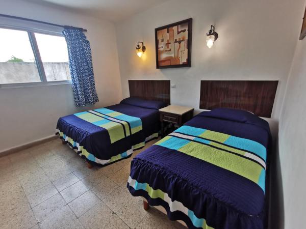 Hotel Las Dalias Inn : photo 7 de la chambre chambre simple standard
